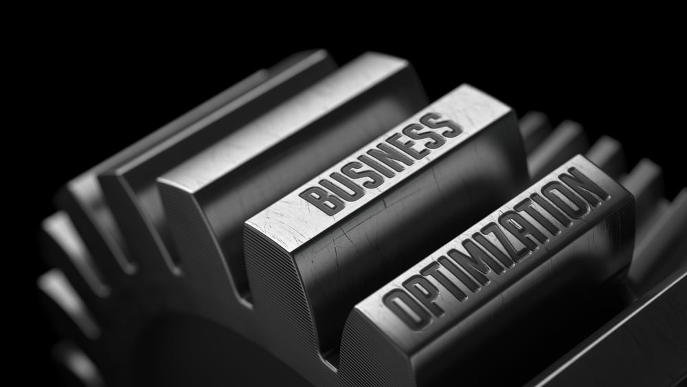 Business Optimization on the Metal Gears on Black Background.